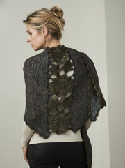 Lenes shawl, a knitted shawl with a flower panel at the back, made in black Isager Highland wool and Silk Mohair