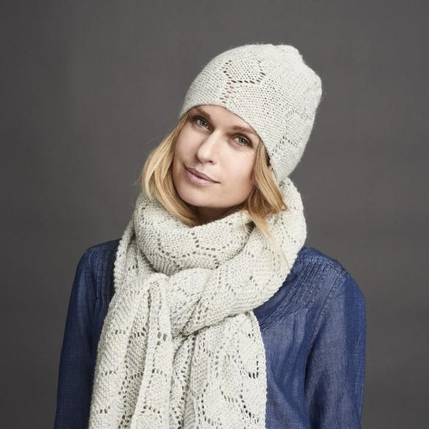 Daggry white knitted hat with beautiful lace pattern, made in Isager Alpaca and Highland wool